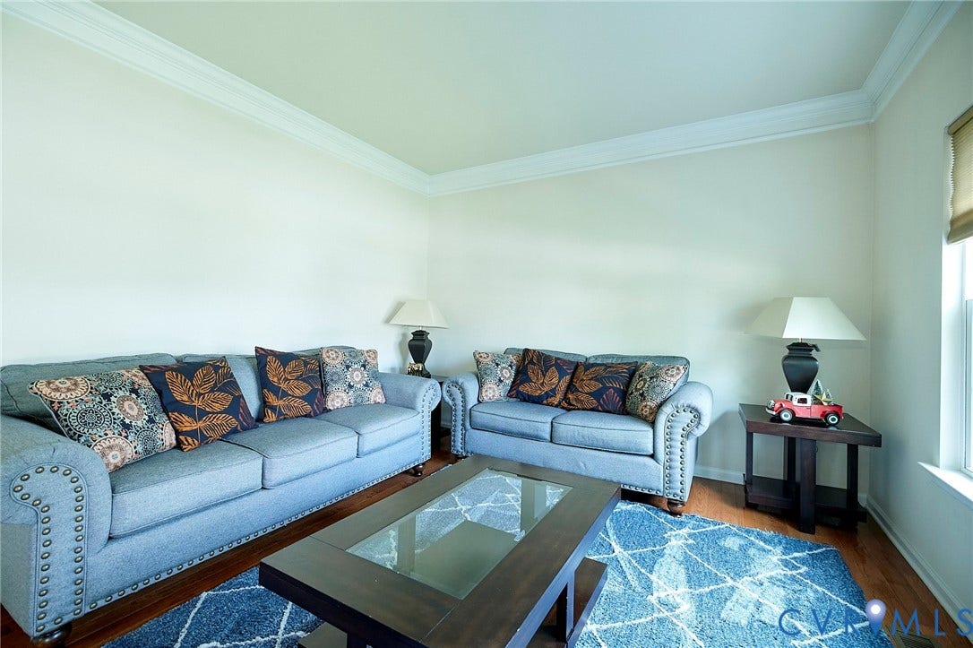 Crown molding accents neutral-toned walls