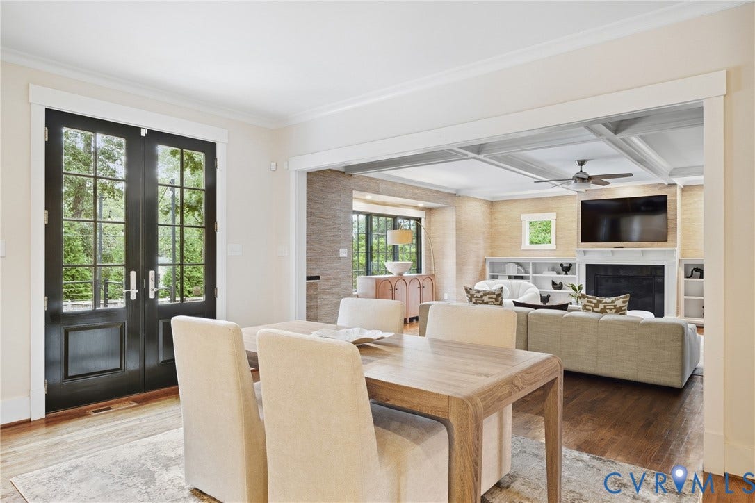 French doors with glass panels, wood-finish flooring, a coffered ceiling, a fireplace with a mantel, and built-in shelving
