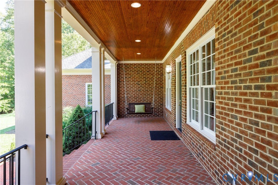 628 Cedar Run Road, Hermitage Country Club Area, Manakin Sabot, VA 23103 Spans the width of the kitchen and family room and offers lovely spaces for dining, entertaining or relaxing at home