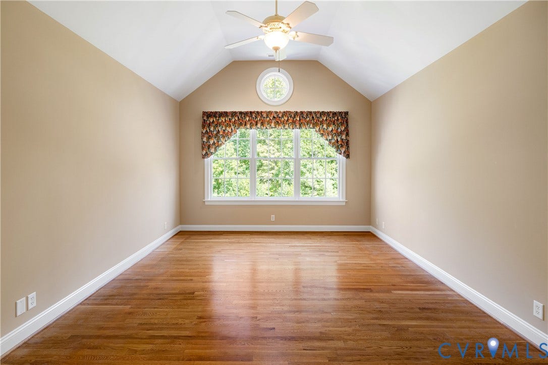628 Cedar Run Road, Hermitage Country Club Area, Manakin Sabot, VA 23103 Bedroom Three features a vaulted ceiling, wood floors, and access to the shared full bath.