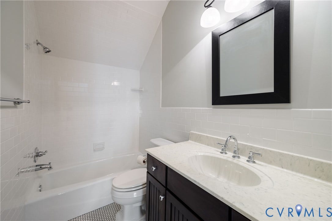 628 Cedar Run Road, Hermitage Country Club Area, Manakin Sabot, VA 23103 Private full bath has a tub/shower and oversized single vanity.