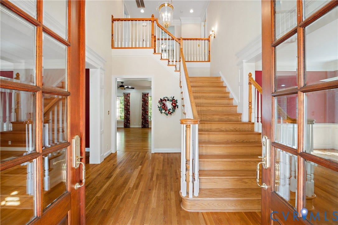 628 Cedar Run Road, Hermitage Country Club Area, Manakin Sabot, VA 23103 The double front doors open to the two-story foyer with open staircase to the second floor.
