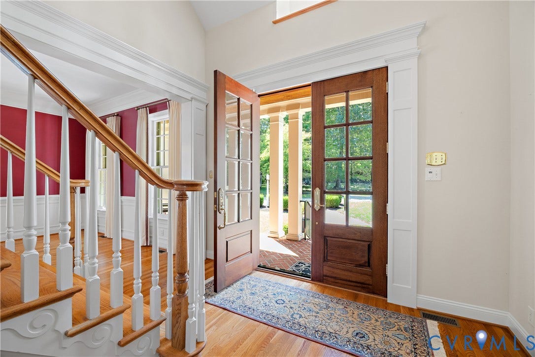 628 Cedar Run Road, Hermitage Country Club Area, Manakin Sabot, VA 23103 Handsome mouldings are showcased in the foyer with view into the formal dining room.