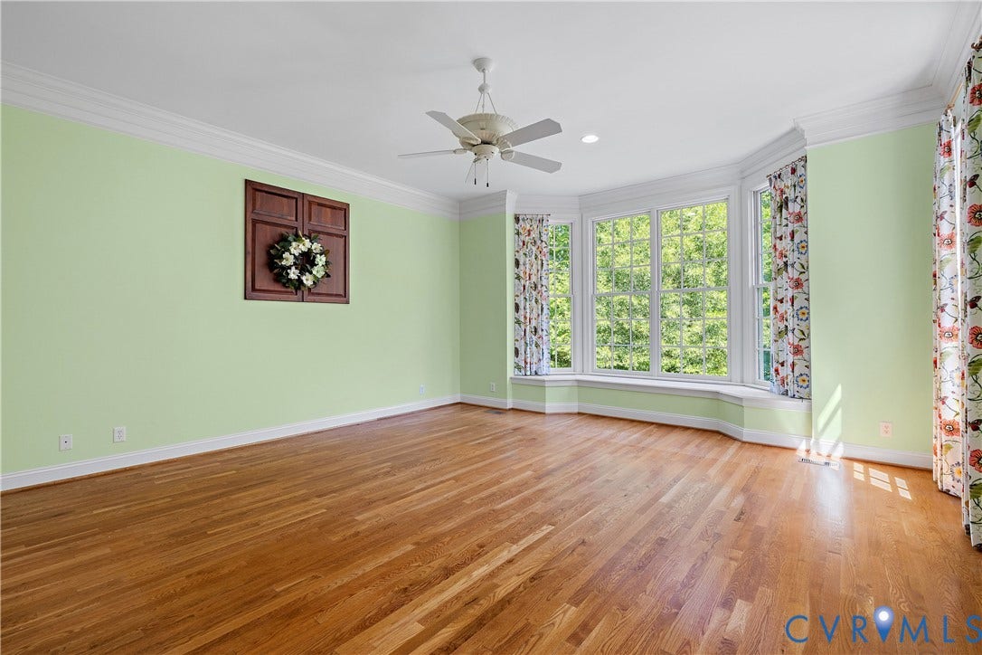 628 Cedar Run Road, Hermitage Country Club Area, Manakin Sabot, VA 23103 Light filled primary bedroom features a distinctive bay window with storage bench.