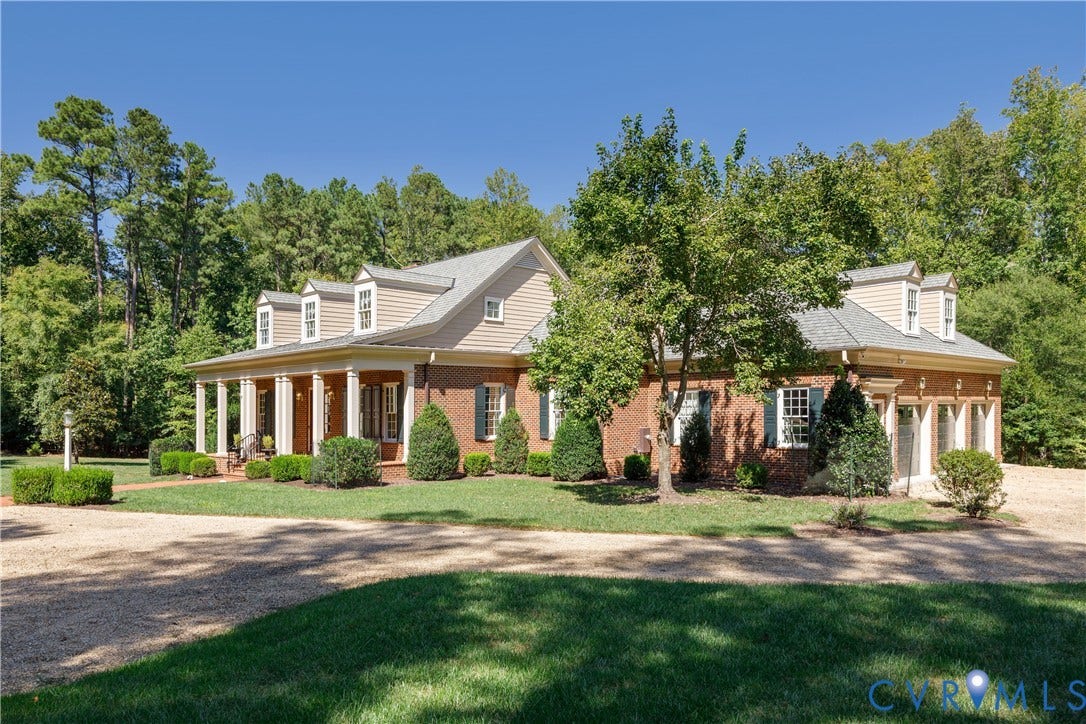 628 Cedar Run Road, Hermitage Country Club Area, Manakin Sabot, VA 23103 Meticulously crafted with brick on four sides and a distinctive covered front porch