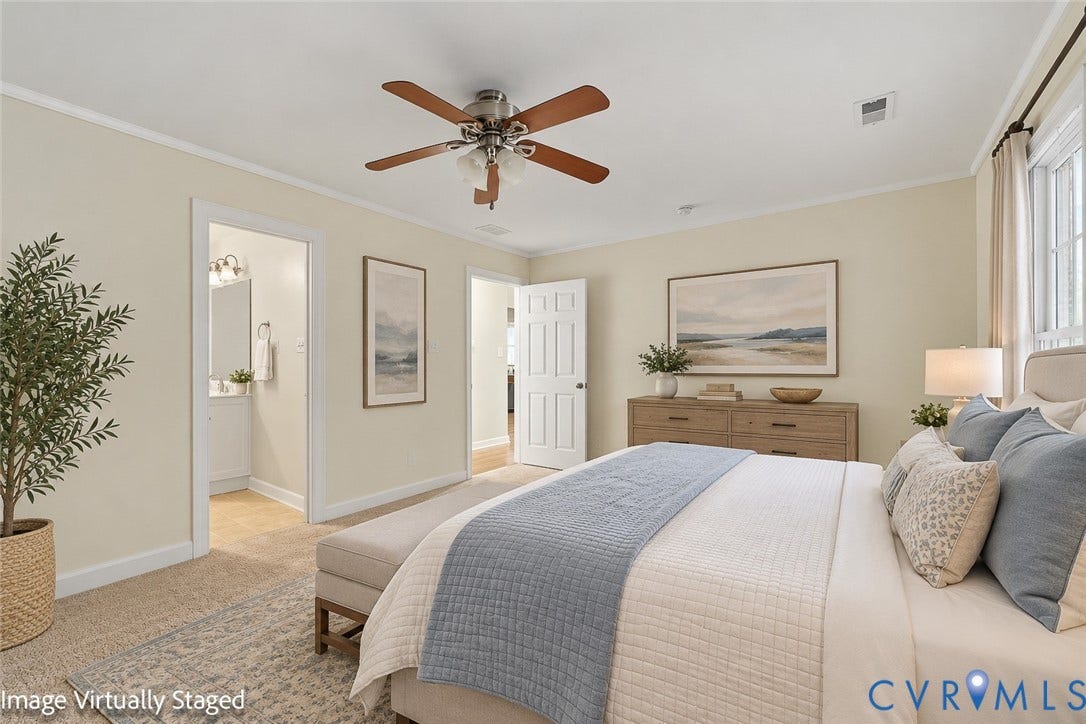 Recessed lighting, ceiling fan with wood-finish blades, and carpeted flooring