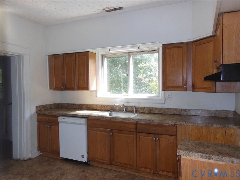 2120 Rhudy Street, Henrico, VA 23222 Wood-finish cabinetry with coordinating countertops