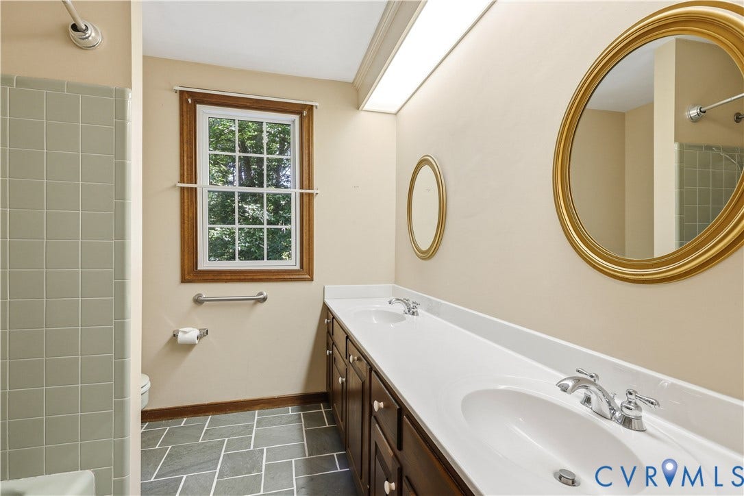 2725 Queenswood Road, Salisbury, Midlothian, VA 23113 Tile flooring and tile surround bathtub. Double vanity too.