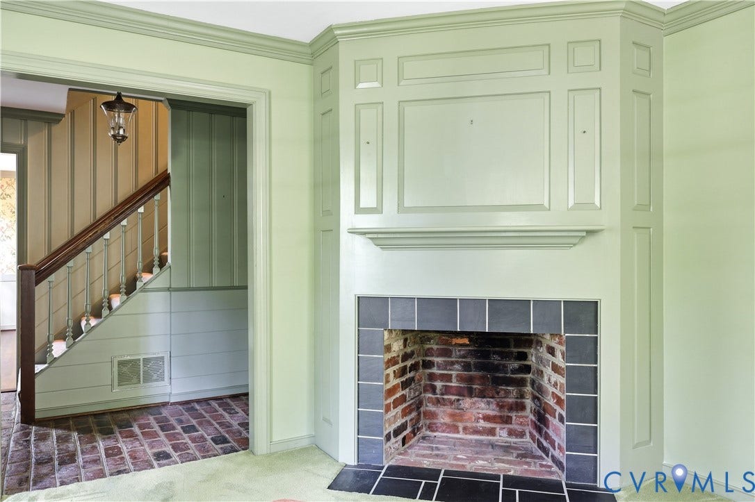 2725 Queenswood Road, Salisbury, Midlothian, VA 23113 Handsome fireplace with brick & slate surround, and magnificently milled, raised paneling!