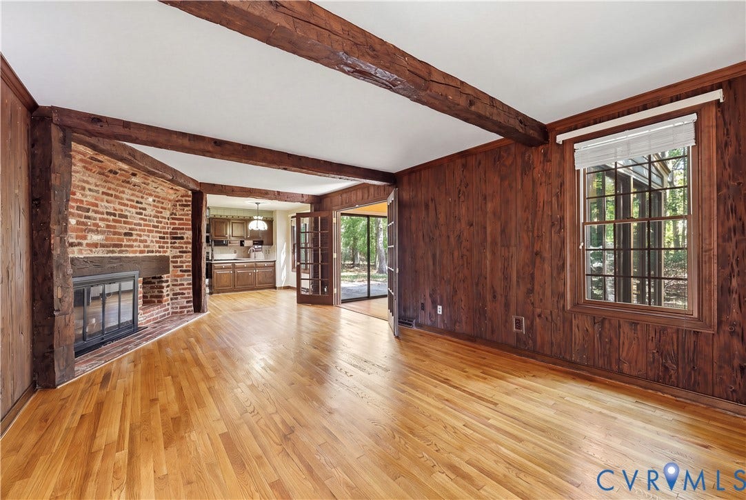 2725 Queenswood Road, Salisbury, Midlothian, VA 23113 Wormy chestnut, raised paneling and rough-hewn beams purportedly salvaged from one of J. P. Morgan's former Connecticut homes.