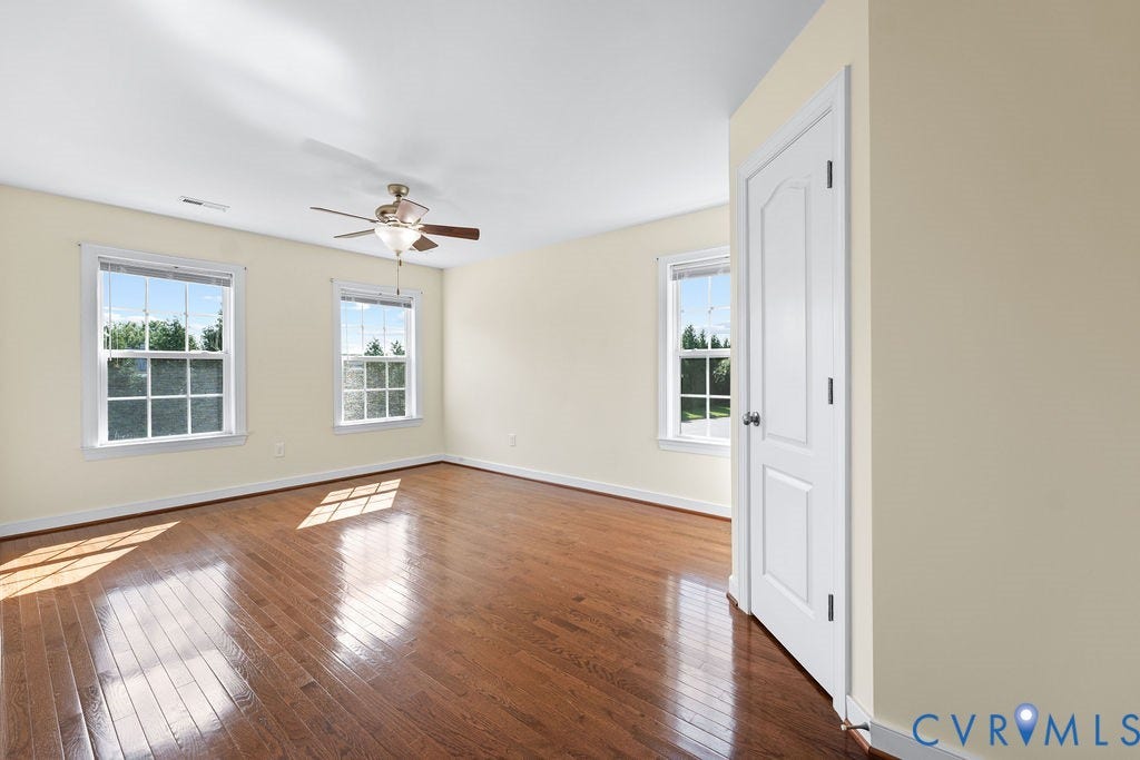 2nd floor bedroom with walk-in closet, and hardwood floors
