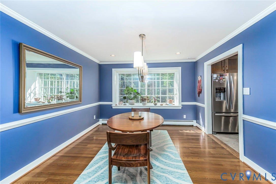 10309 Collinwood Drive, Henrico, VA 23238 Dining Room with hardwood flooring, crown molding, chair rail molding, recessed lighting, chandelier and large picture window overlooking backyard