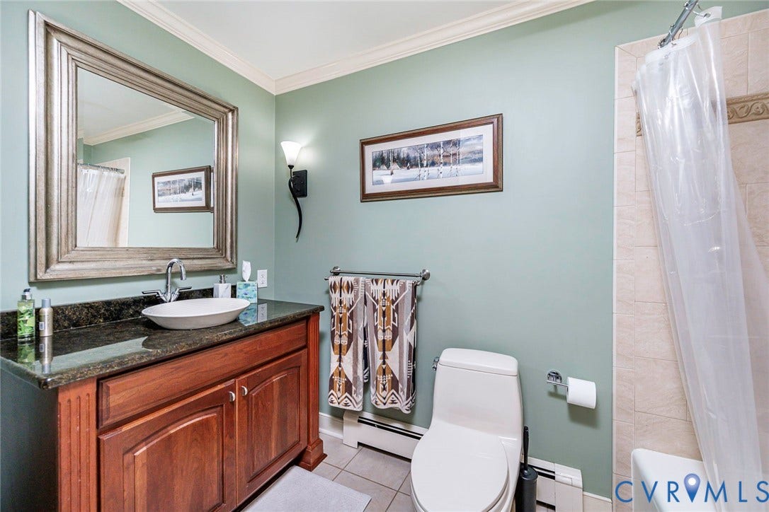 10309 Collinwood Drive, Henrico, VA 23238 First floor Hall bathroom with tile flooring, full shower and tub