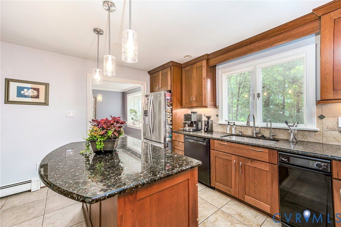 10309 Collinwood Drive, Henrico, VA 23238 Kitchen featuring with large Center Island and picture window looking out over backyard