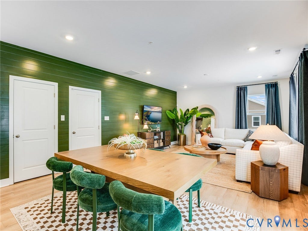 3712 Larimar Lane, Everstone, Richmond, VA 23222 Open-concept living area with wood-finish flooring, recessed lighting, and a prominent green accent wall