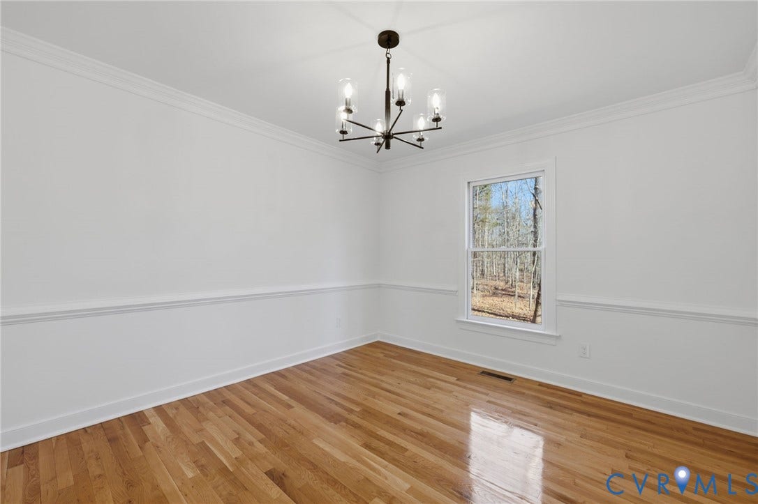 3264 Sherwood Ridge Way, Powhatan, VA 23139 Wood-finish flooring, single window, and a built-in ceiling light fixture