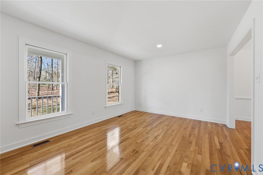 3264 Sherwood Ridge Way, Powhatan, VA 23139 Wood-finish flooring, single window, and a built-in ceiling light fixture