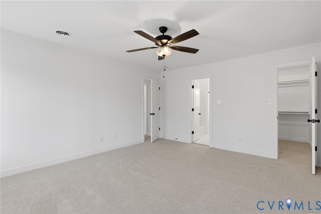 3264 Sherwood Ridge Way, Powhatan, VA 23139 Walk-in closet with carpet flooring, white walls, and built-in shelving