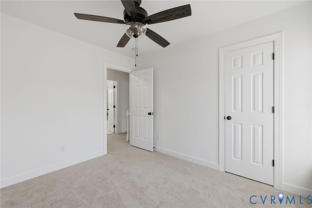 3264 Sherwood Ridge Way, Powhatan, VA 23139 Neutral wall color, carpet flooring, ceiling fan, and white paneled doors
