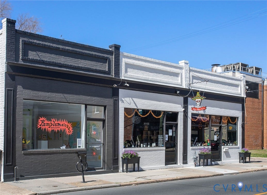 2604 Grove, #5, Richmond, VA 23220 Brick facade with contrasting dark and light paint, large storefront windows, and decorative cornice details