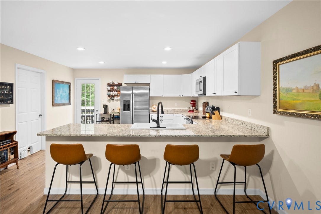 6626 Jackson Road, Quinton, VA 23141 A large center island with seating makes this kitchen ideal for cooking and casual gathering.