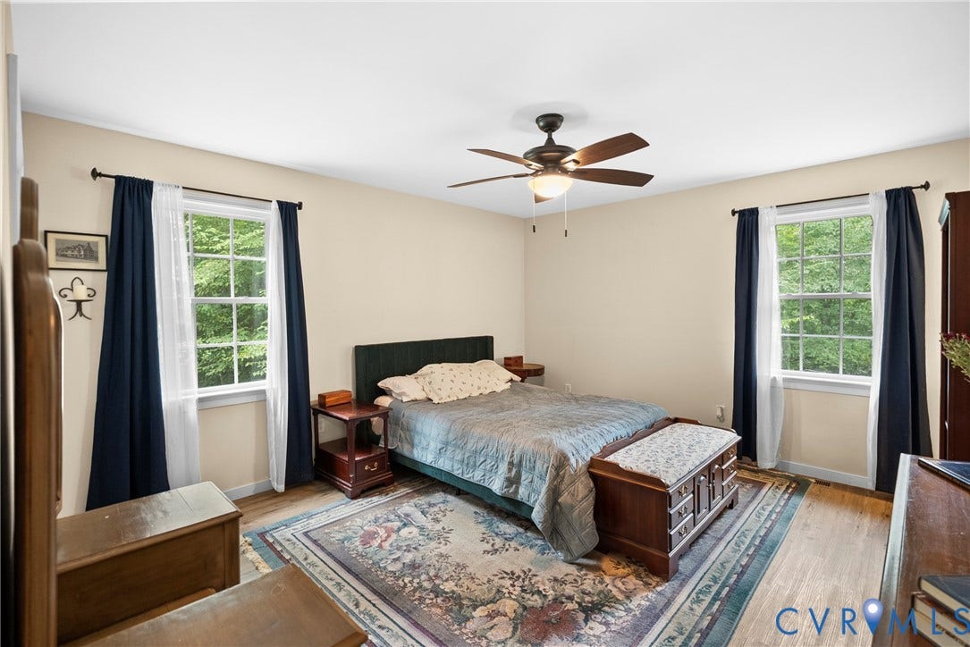 6626 Jackson Road, Quinton, VA 23141 The primary bedroom offers a comfortable retreat with plenty of natural light and easy-care flooring.