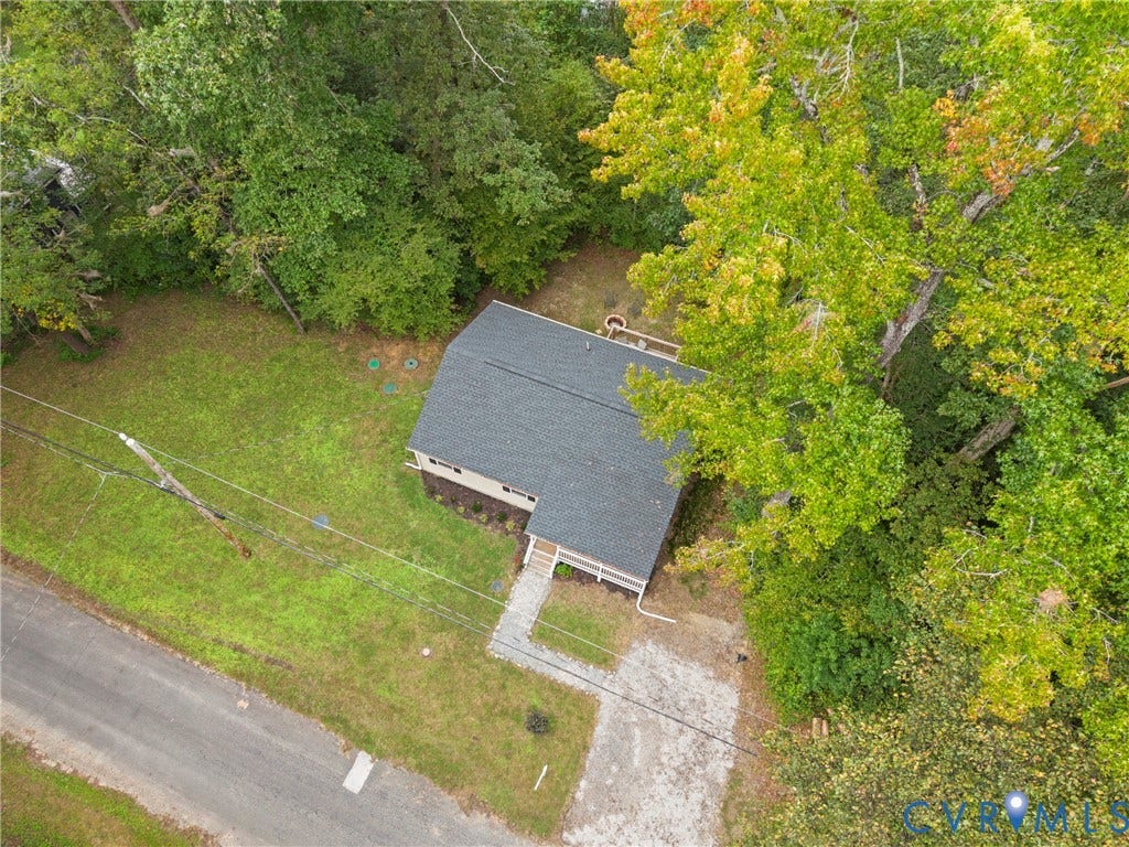 6626 Jackson Road, Quinton, VA 23141 An aerial perspective highlights the home's wooded, 0.57-acre lot and peaceful surroundings.