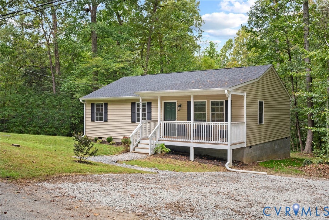 6626 Jackson Road, Quinton, VA 23141 A gravel driveway and covered porch add to the home's welcoming, low-maintenance curb appeal.