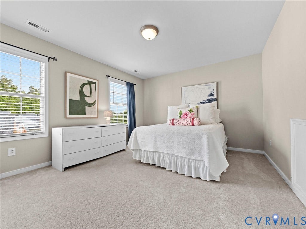 1663 Centerville Parke Lane, The Parke At Centerville, Manakin Sabot, VA 23103 Light neutral wall paint, two windows with blinds, built-in ceiling light fixture, and plush carpeting