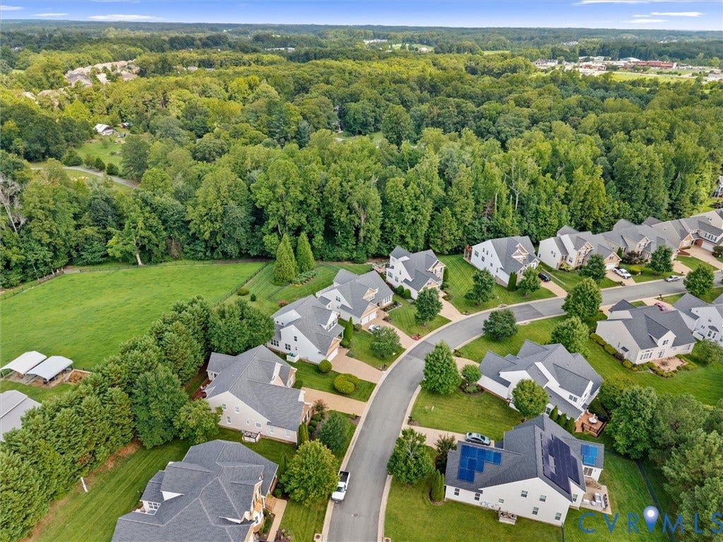 1663 Centerville Parke Lane, The Parke At Centerville, Manakin Sabot, VA 23103 Residential community featuring detached homes, mature landscaping, and surrounding wooded areas