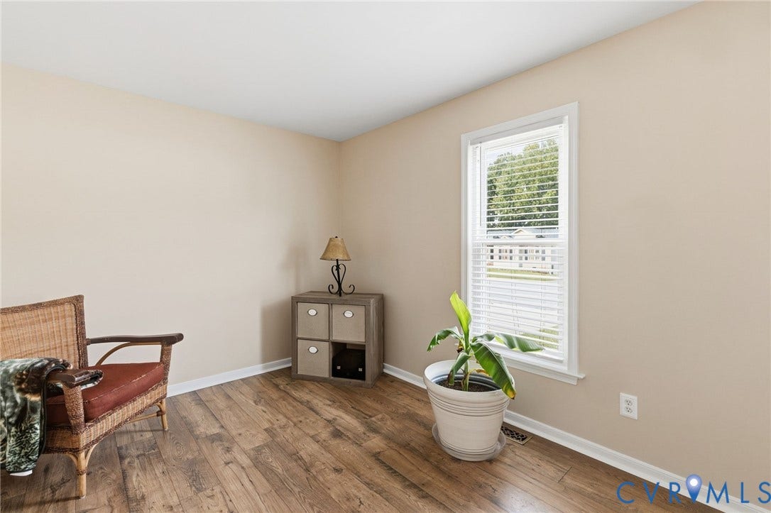 1429 Almondberry Place, Henrico, VA 23231 Wood-finish flooring, neutral wall tones, white window frame, and white trim