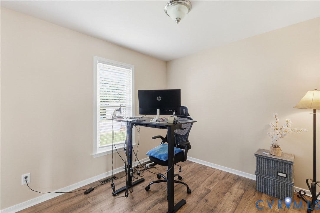 1429 Almondberry Place, Henrico, VA 23231 Room featuring wood-finish flooring, a window with blinds, and a semi-flush ceiling light fixture