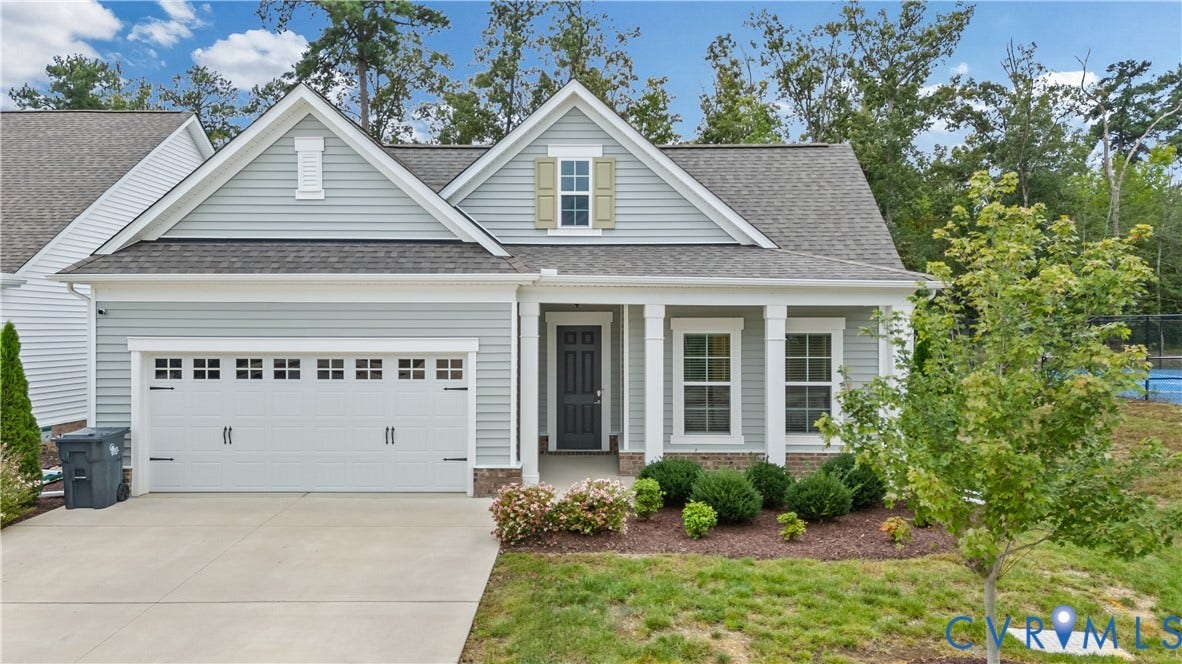 1769 Outrigger Drive, Twin Rivers @ Meadowville, Chester, VA 23836 Light blue siding exterior with a dark gray shingle roof