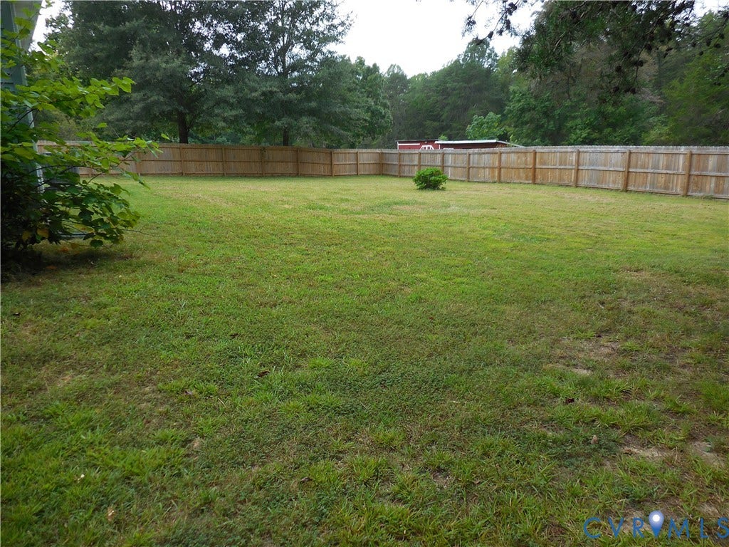 6185 Parrish Road, Louisa, VA 23093 Expansive lawn area enclosed by a wood privacy fence