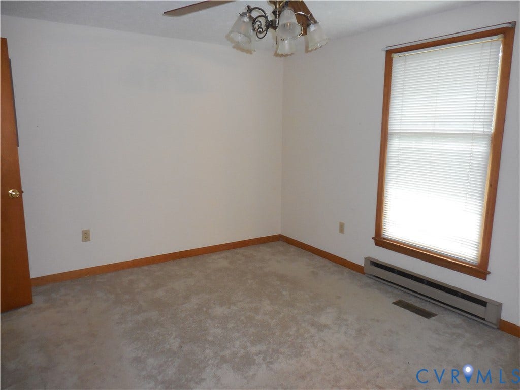 6185 Parrish Road, Louisa, VA 23093 Carpeted flooring, white walls, and a window with blinds