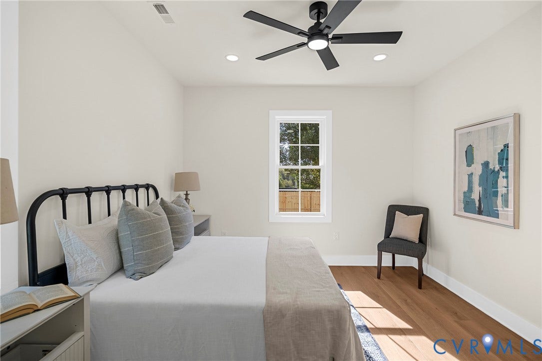 Hardwood flooring, recessed lighting, ceiling fan, white trim, and a window with a paneled grid