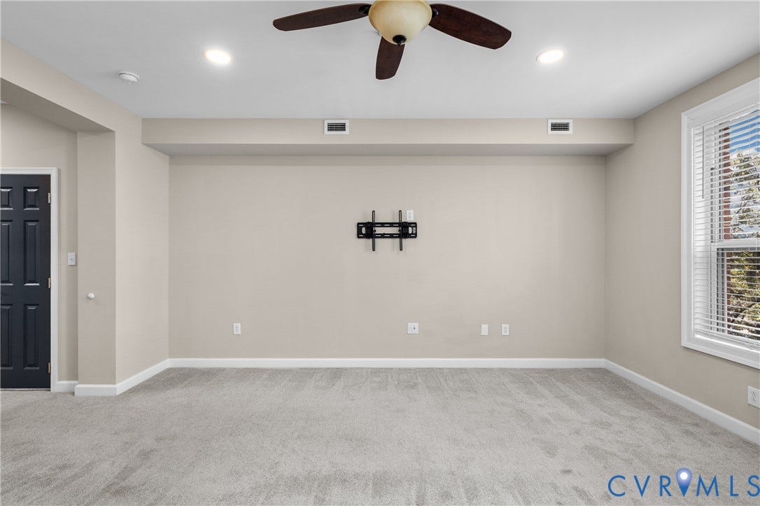 4820 Old Main Street, #301, Henrico, VA 23231 Recessed lighting, ceiling fan, neutral carpet, white trim, and a window with blinds