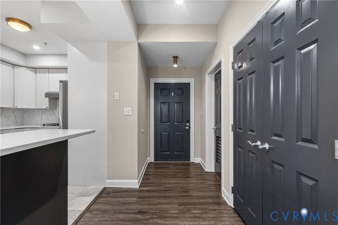 4820 Old Main Street, #301, Henrico, VA 23231 Luxury vinyl tile flooring, paneled interior doors, upgraded gold finishes, and recessed lighting.