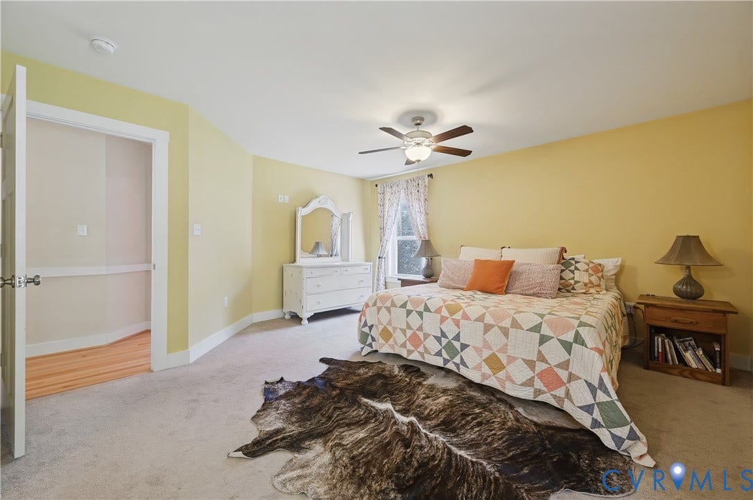 700 Manchester Road, Louisa, VA 23024 Recessed window, ceiling fan with light, and light carpet flooring
