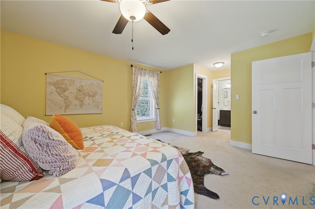 700 Manchester Road, Louisa, VA 23024 Ceiling fan, window with natural light, neutral carpeting, paneled interior door, and a built-in closet