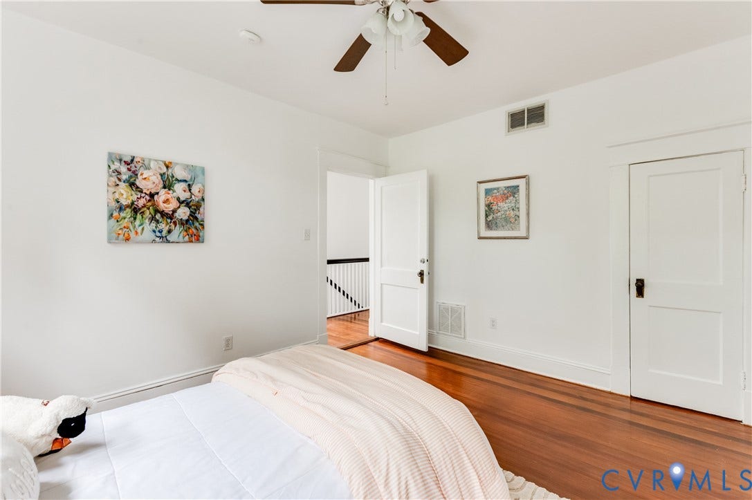 2224 Seminary Avenue, Richmond, VA 23220 Hardwood flooring, painted interior doors, ceiling fan, and white walls