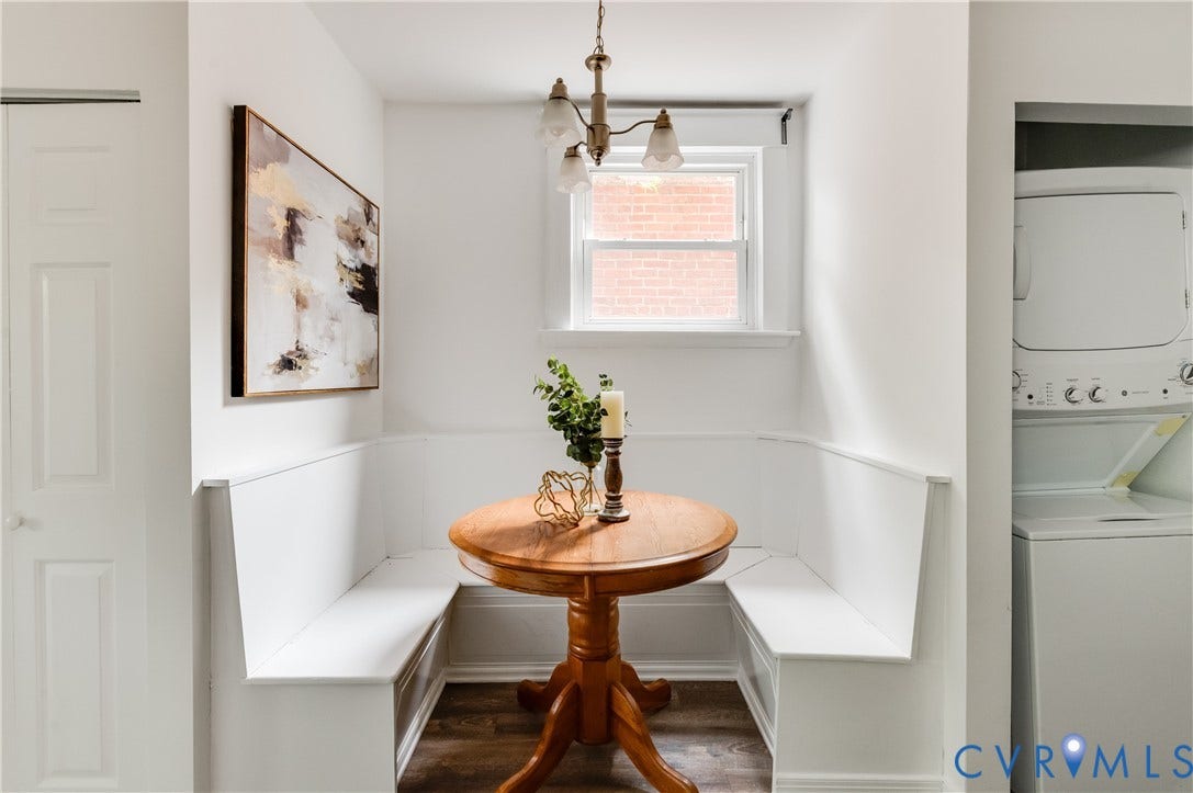 2224 Seminary Avenue, Richmond, VA 23220 Built-in banquette seating with storage, wood-finish flooring, and a window with natural light
