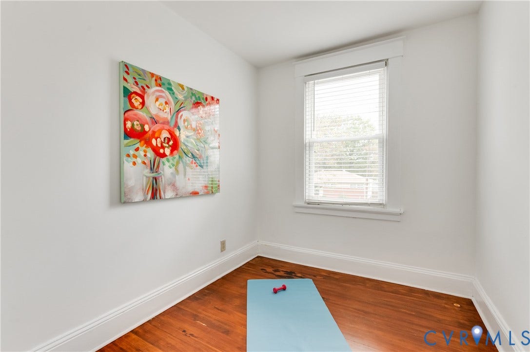 2224 Seminary Avenue, Richmond, VA 23220 Wood-finish flooring, white painted walls, and a single window with blinds