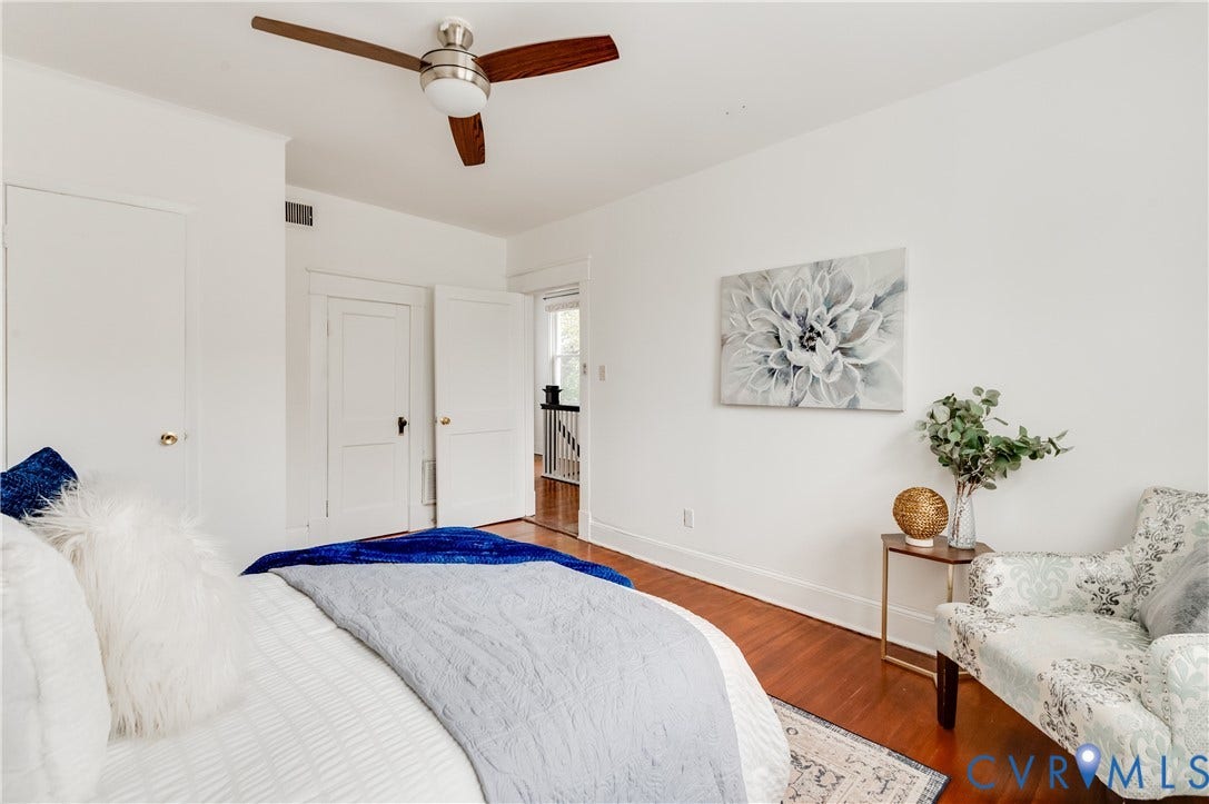 2224 Seminary Avenue, Richmond, VA 23220 Hardwood flooring, painted white walls, ceiling fan, white trim, and white doors