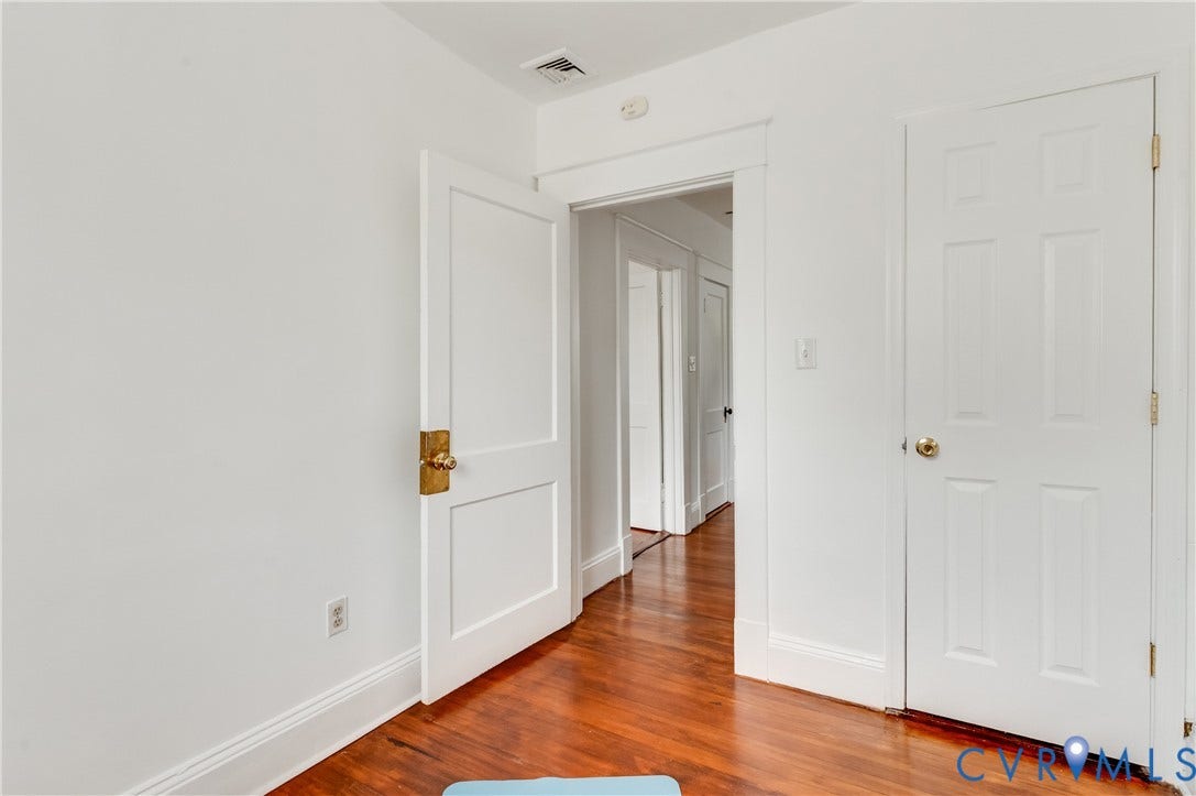 2224 Seminary Avenue, Richmond, VA 23220 Hardwood flooring, painted white walls, white trim, and solid core doors