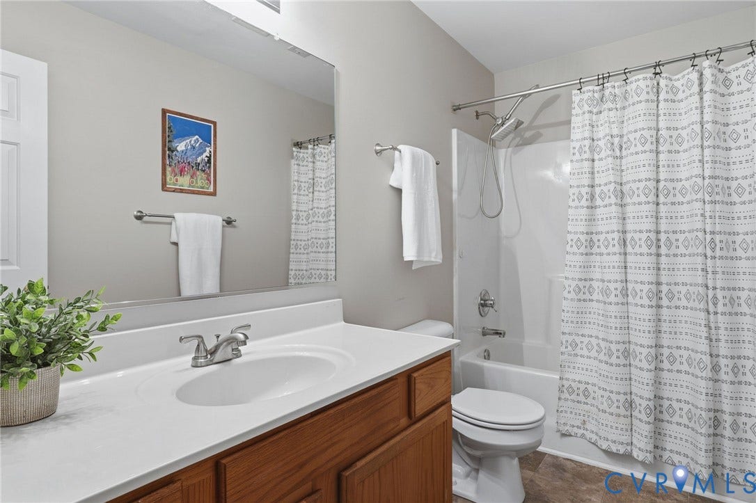 932 Ayers Way, Ayers Tavern, Glen Allen, VA 23060 Full bathroom featuring a single vanity with a white countertop and wood-finish cabinetry