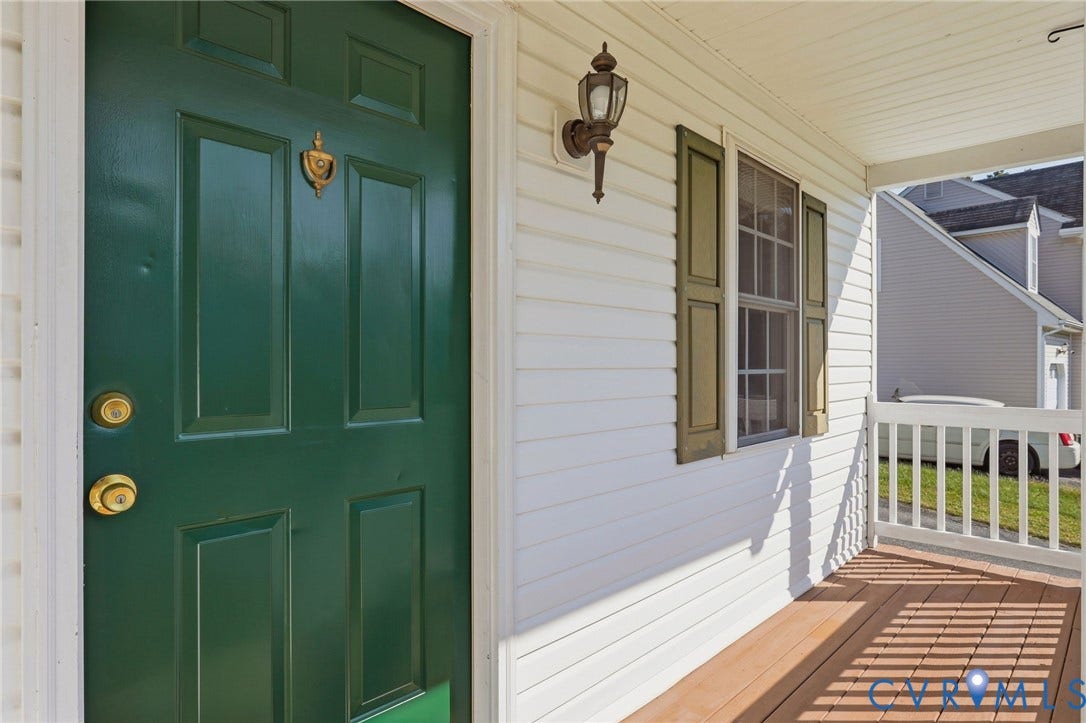 932 Ayers Way, Ayers Tavern, Glen Allen, VA 23060 Entry porch featuring a paneled door, decorative door knocker, and wood-finish flooring