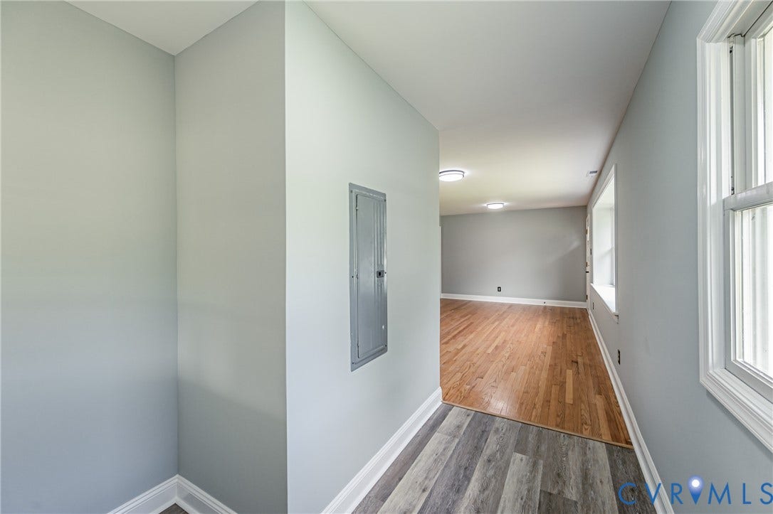 1724 Alaska Drive, Richmond, VA 23224 Hardwood flooring throughout, recessed ceiling lighting, and a window with white trim