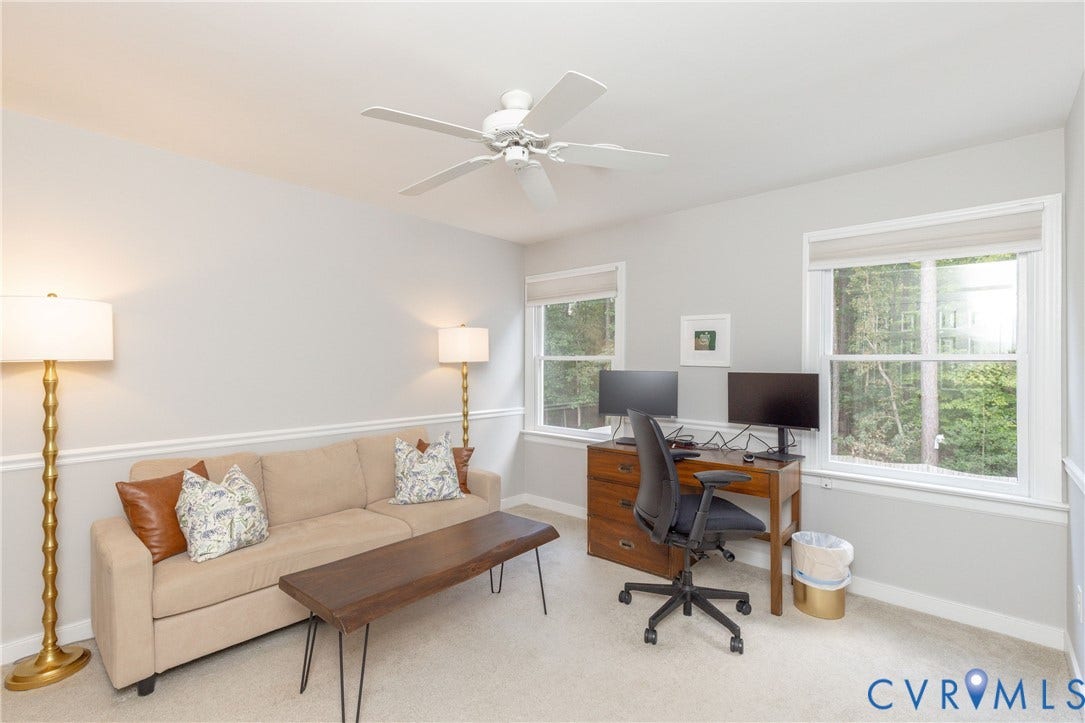 2120 Willowick Lane, Henrico, VA 23238 Vaulted ceiling with a ceiling fan, dual windows, and light gray wall paint with white chair rail molding