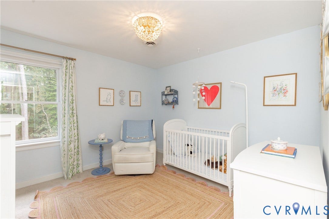 2120 Willowick Lane, Henrico, VA 23238 Recessed window with natural light, light blue wall paint, and a decorative ceiling light fixture